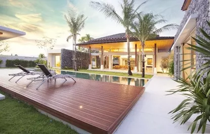 Swimming pool with a sliding deck cover for multi-purpose space usage